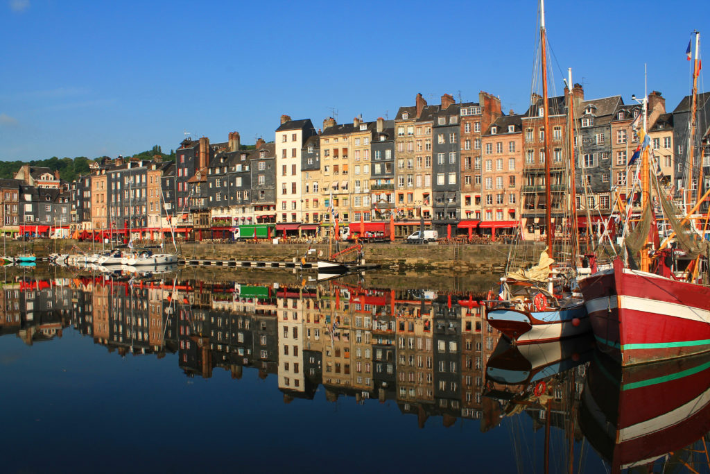 The Vieux-Bassin in Honfleur harbor is lined with wonderful cafés. It's one of my recommended places to visit in France
