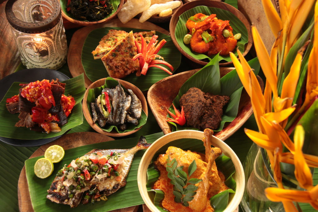 Selection of food dishes in an Indonesian Rijsttafel served in the Netherlands