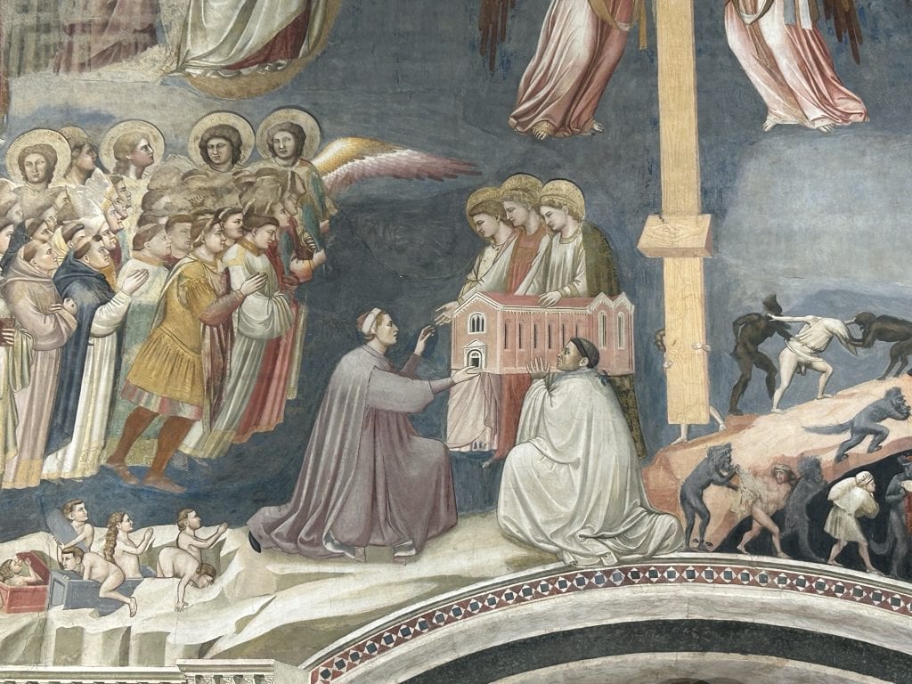 A detailed fresco by Giotto in Padua, depicting biblical scenes with vivid colors and lifelike expressions. A masterpiece to admire while exploring Padua’s cultural treasures.