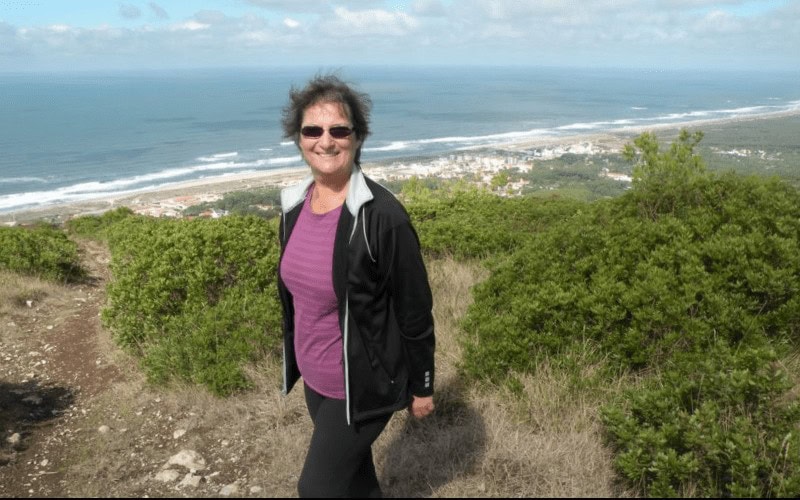 Carol Cram on a cliff above the Atlatnic ocean in northern Portugal