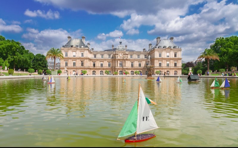 Large pool with remote controlled sailboat in the Luxembourg Gardens in Paris