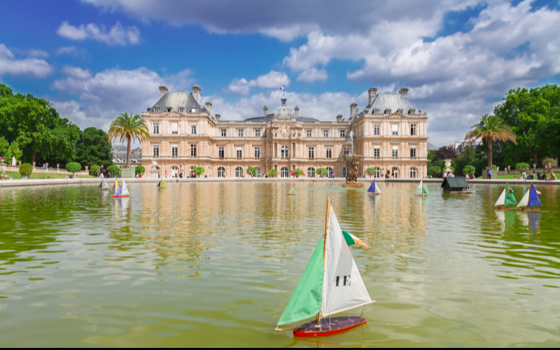 Large pool with remote controlled sailboat in the Luxembourg Gardens in Paris