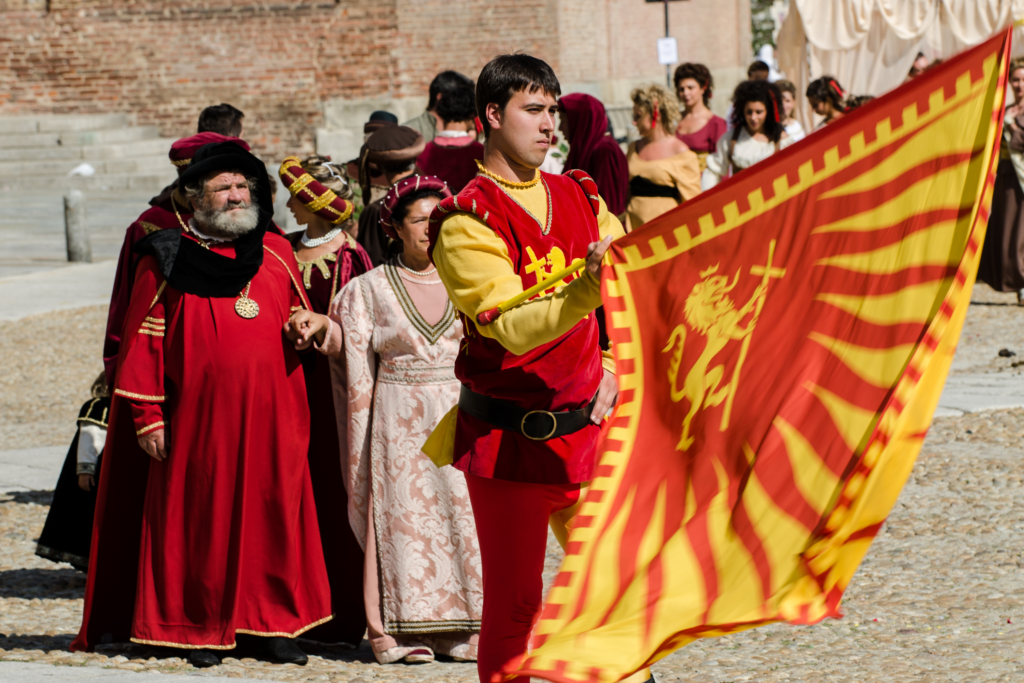 Parade of people dressed in medieval costumes