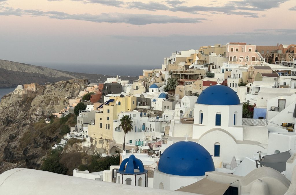 Iconic shot of Oia showing the famous 3 blue domes