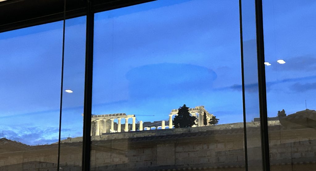 Floodlit view of the Acropolis from the Acropolis Museum