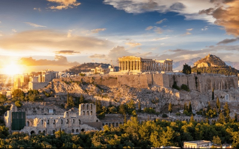 View of Athens and the Acropolis of Athens: A panoramic view showcasing the city of Athens with the Acropolis prominently perched on a hilltop, highlighting its significance as a UNESCO World Heritage site.