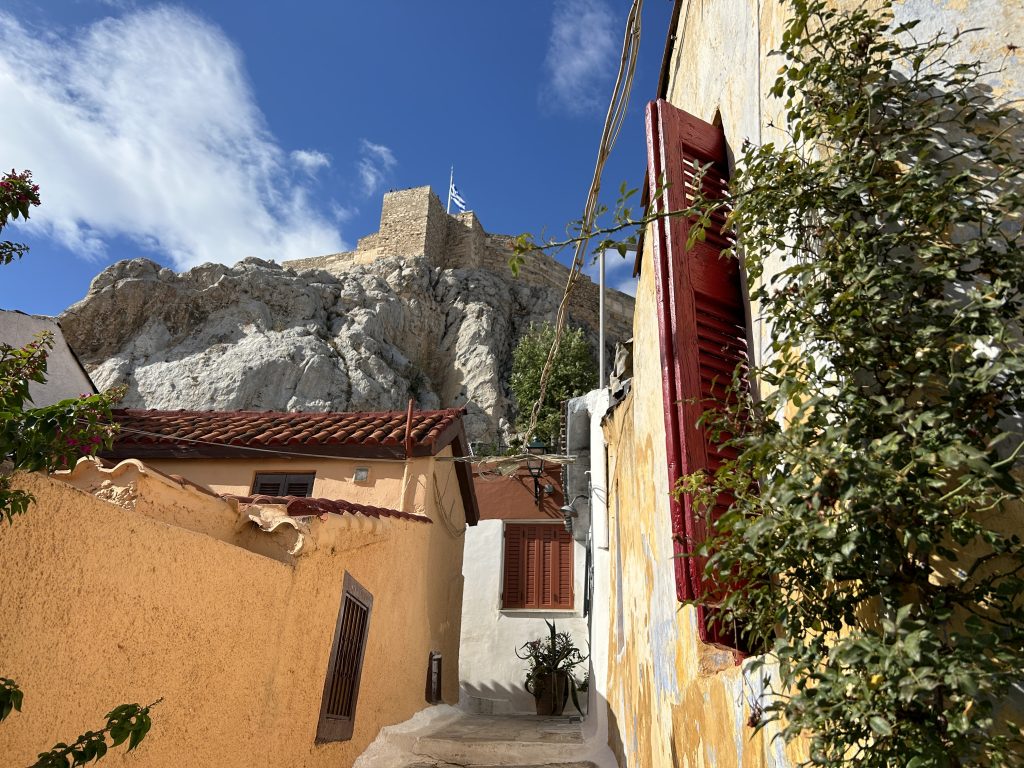 View of the charming neighborhood of Anafliotika with the Acropolis in the background