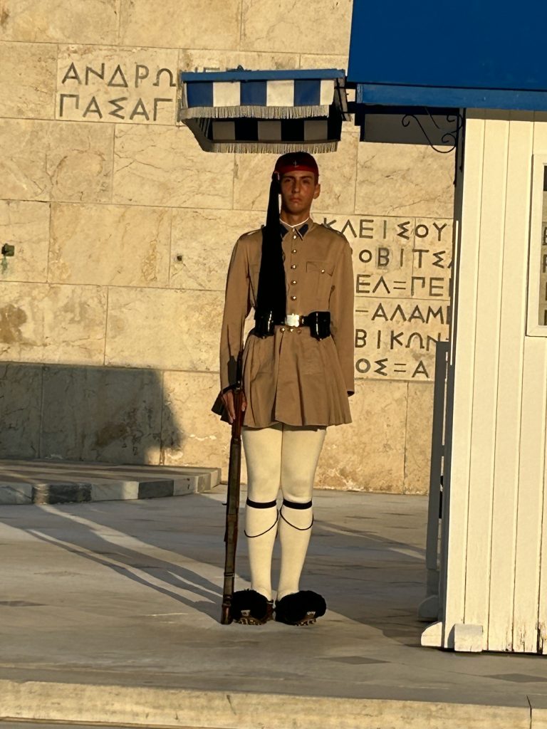 Guard standing in front of the Hellenic Parliament in Athens