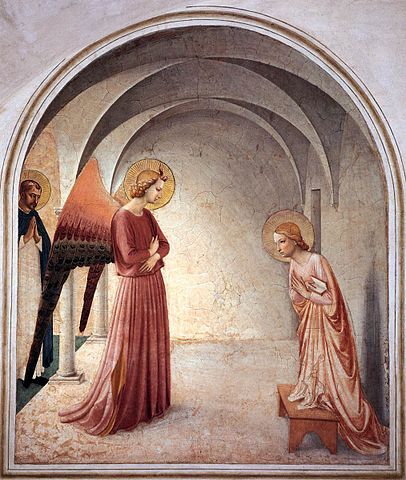 A fresco depicting the Annunciation by Fra Angelico. The image shows the Archangel Gabriel, with golden wings and a pink robe, addressing the Virgin Mary, who is seated and holding a book, within an arched architectural setting.