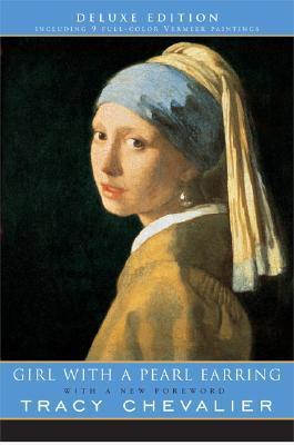 Book cover of Girl with a Pearl Earring by Tracy Chevalier. The cover features the famous painting of a young girl wearing a blue and yellow headscarf and a large pearl earring, looking over her shoulder. The background is black, and the title and author's name are displayed in white letters on a blue banner at the bottom. The top banner mentions "Deluxe Edition" and "Including 9 Full-Color Vermeer Paintings."