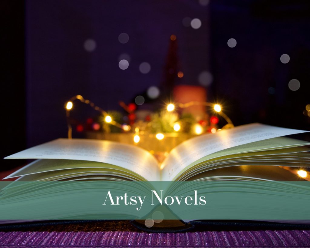 An open book with fairy lights wrapped around it, set against a blurred, warm background. The text overlay reads "Artsy Novels."

